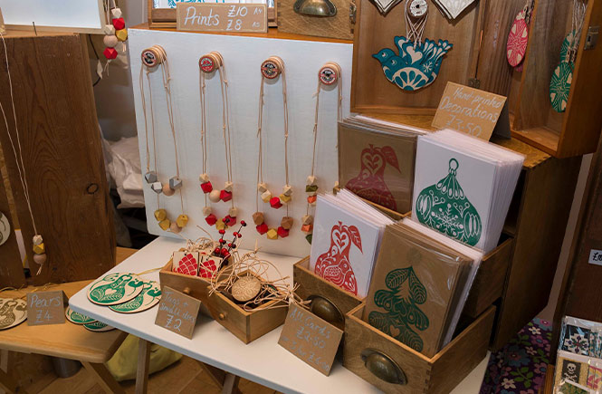 A stall at the Jubilee Wharf Christmas Fair selling jewellery and Christmas cards