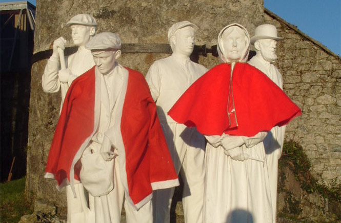 Some of the mining statues at Wheal Martyn decorated for Christmas