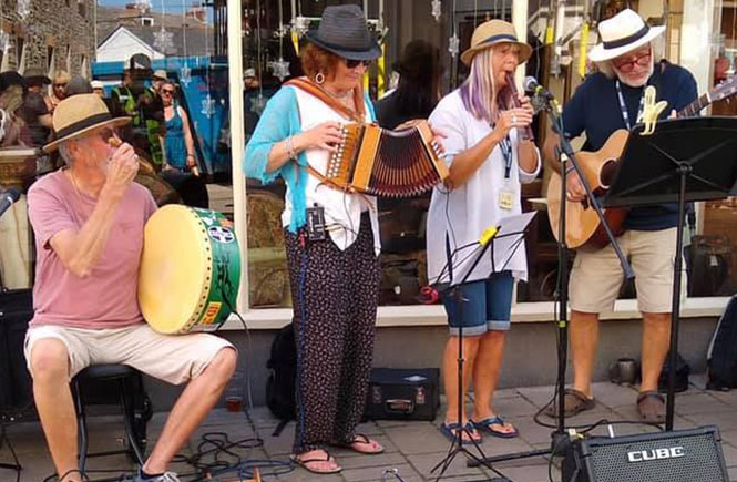 One of the many folk bands performing in the street during the Cornwall Folk Festival