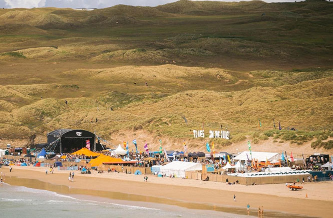 The impressive Tunes in the Dunes music festival spread out across Perranporth beach with the dunes behind