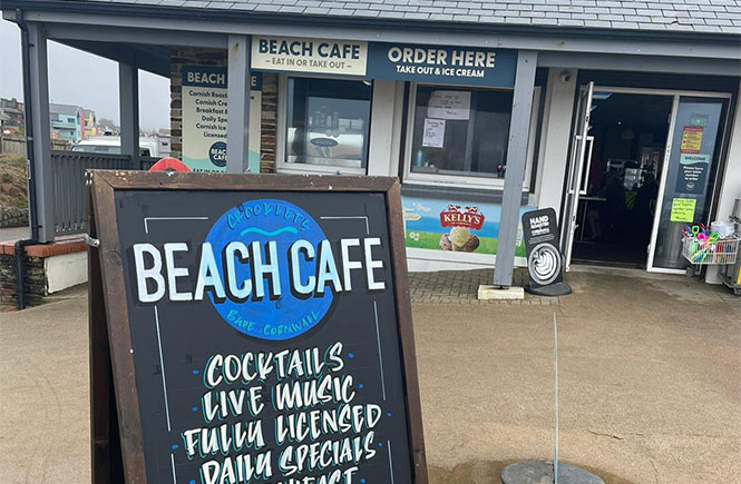 A blackboard sign outside of the popular Crooklets Beach Café, one of the best places to eat in Bude