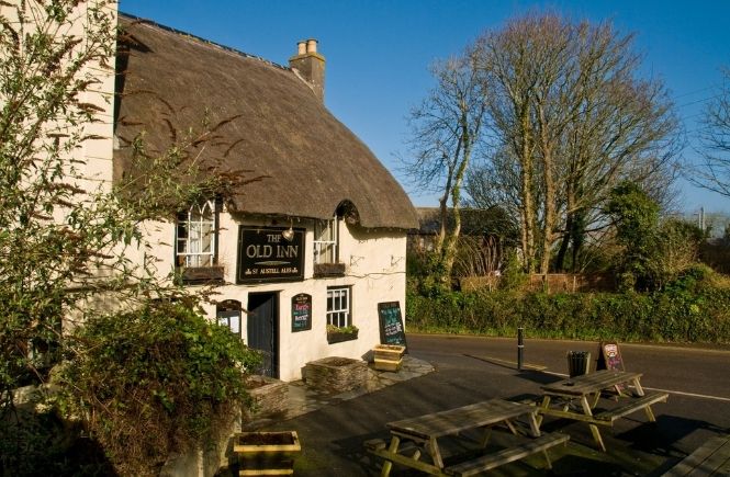 The thatched building of The Old Inn on a sunny day
