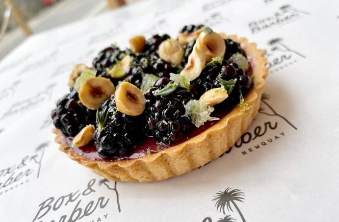 A blackberry tart on Box and Barber paper