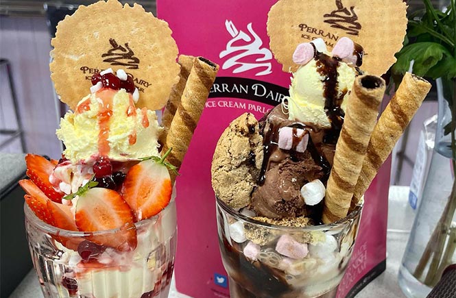 Two ice cream Sundays full of ice cream and chocolate sauce at Perran Dairy Ice Cream Parlour