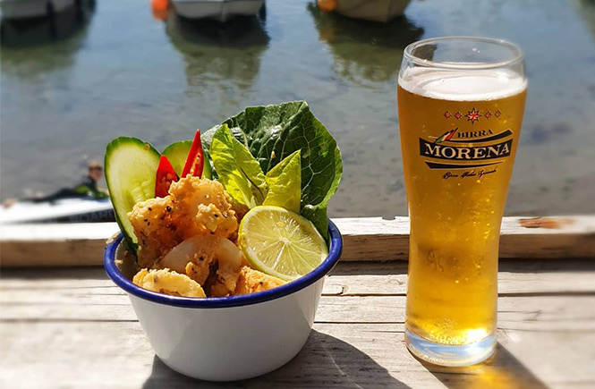 Seafood and beer over looking Porthleven harbour at The Mussel Shoal