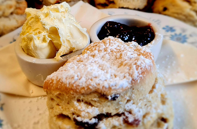 A fruit scone with clotted cream and strawberry jam at Twisted Currant in Porthleven