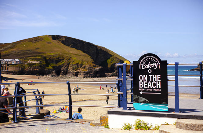 Portreath Bakery sign at Portreath beach where you can get one of the best Cornish pasties in Cornwall