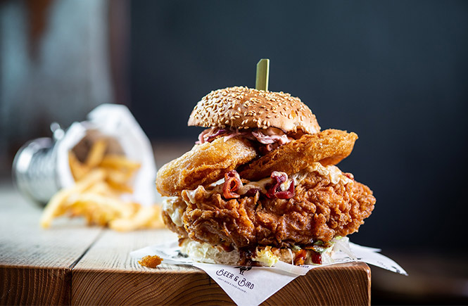 A massive fried chicken burger and fries at Beer & Bird in St Ives