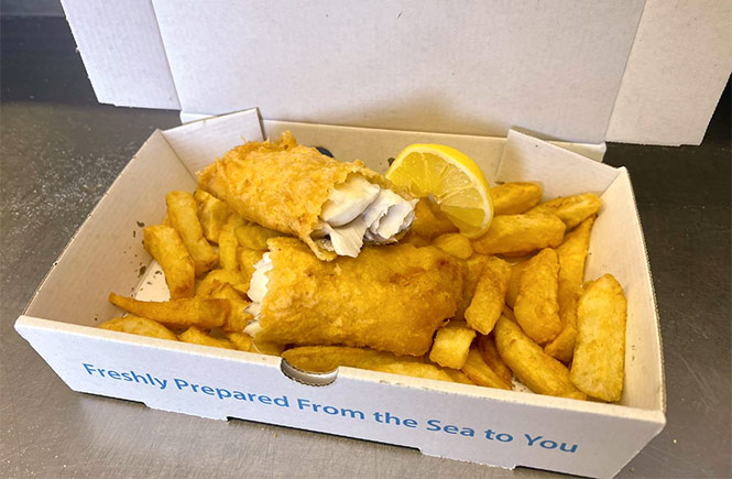 A box of Sharky's fish and chips in Cornwall