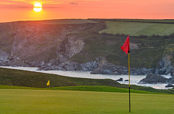 One of the stunning cliff-side courses at Mullion Golf Club at sunset