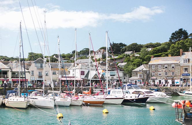 The pretty harbour at Padstow full of colourful boats