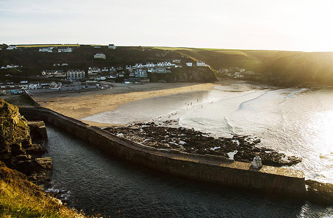 Looking out across the harbour at Portreath with its golden beach
