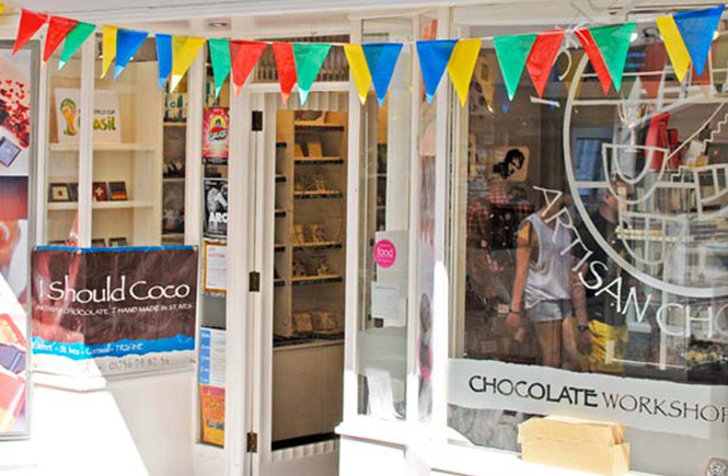 Bunting hangs outside the chocolate filled I Should Coco in St Ives