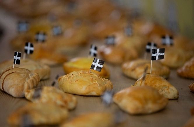 Lots of Cornish pasties with Cornish flags in them at the World Pasty Championships at the Eden Project