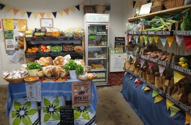 Shelves full of fruit and veg at Bosavern Community Farm Shop