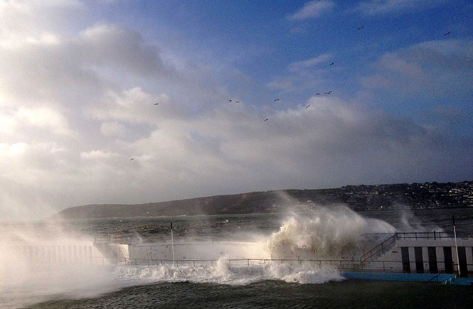 Waves crashing over Jubilee Pool