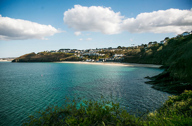 Looking out over the emerald waters at Carbis Bay Beach in Cornwall