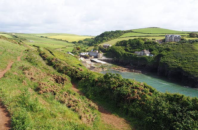 The pretty inlet at Port Quin, where cottages sit on the cliffside