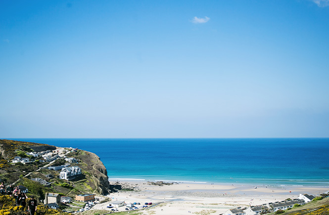 Looking out over the white sands and blue seas at Porthtowan beach