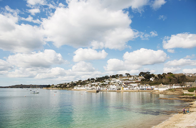 Looking down the beach at the sea and St Mawes harbour beyond