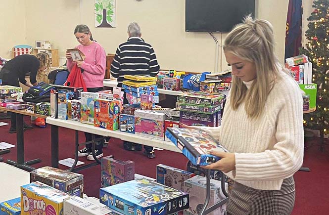 Aspects Holidays packs gifts for the Salvation Army Christmas Toy Appeal