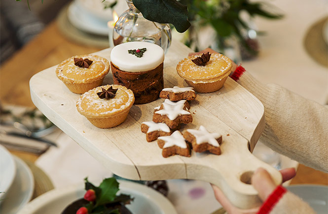 A selection of Christmas desserts on a board during a festive feast in Cornwall