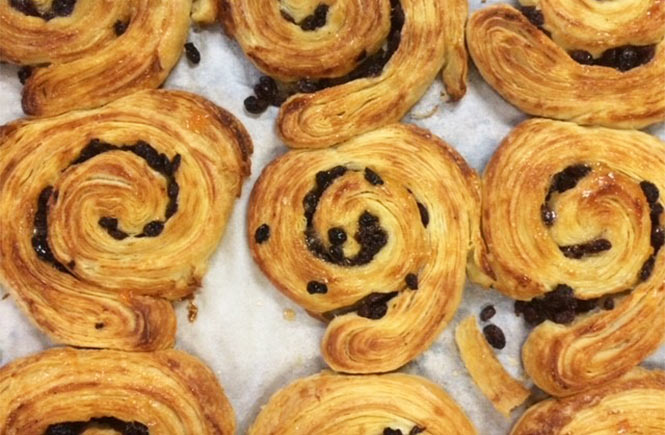 Rows of pain au raisins from Stones Bakery in Cornwall