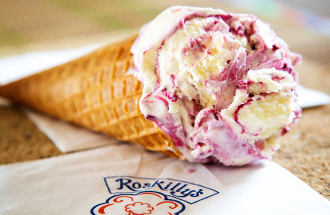 An ice cream on its side on top of a Roskilly's napkin