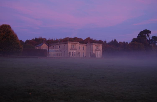 Scorrier House shrouded in mist