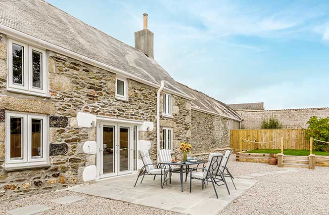 A long refurbished granite barn 