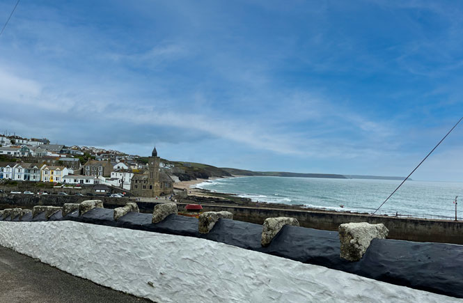 The view across the village of porthleven and beyond to the sea.