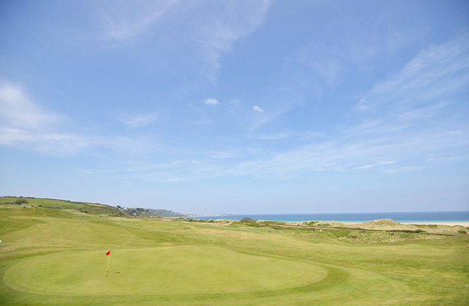 Looking across the golf course with the sea in the background at West Cornwall Golf Club