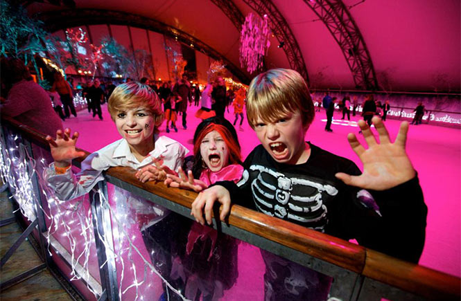 Children skating on the ice rink at the Eden Project during Halloweden