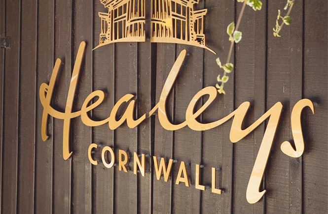 The golden sign at Healeys Cyder Farm in Cornwall