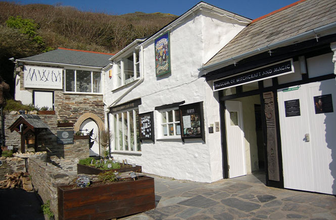 The white exterior of the Museum of Witchcraft and Magic in Cornwall