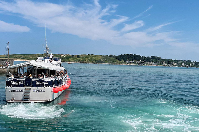 The Jubilee Queen on the sea off the coast of Padstow, North Cornwall