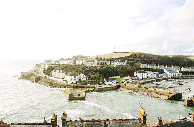 Looking down at Porthleven harbour across houses