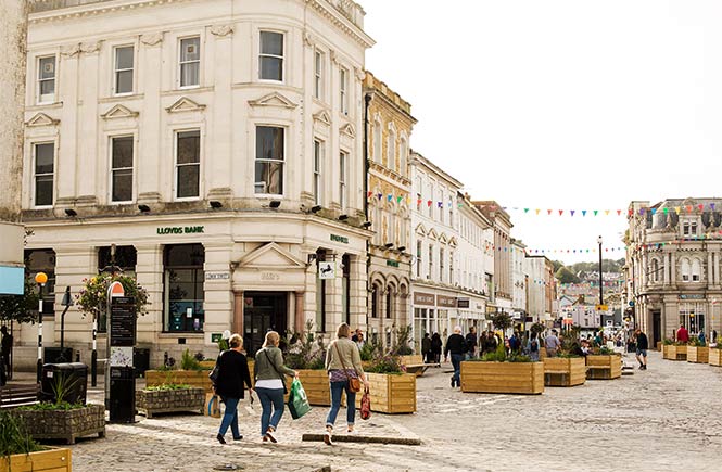 People walking along the cobbled streets in Truro